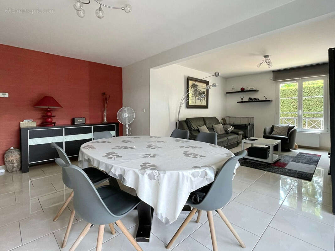 Appartement en rez-de-jardin avec garage, parking, cave, terrasse et jardin - photo 5