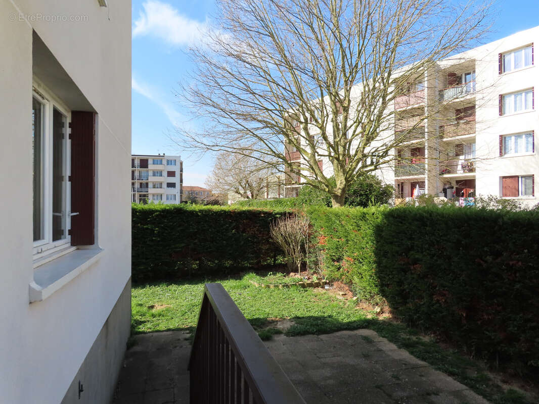 Appartement T3 avec jardin, cave et parking - photo 2
