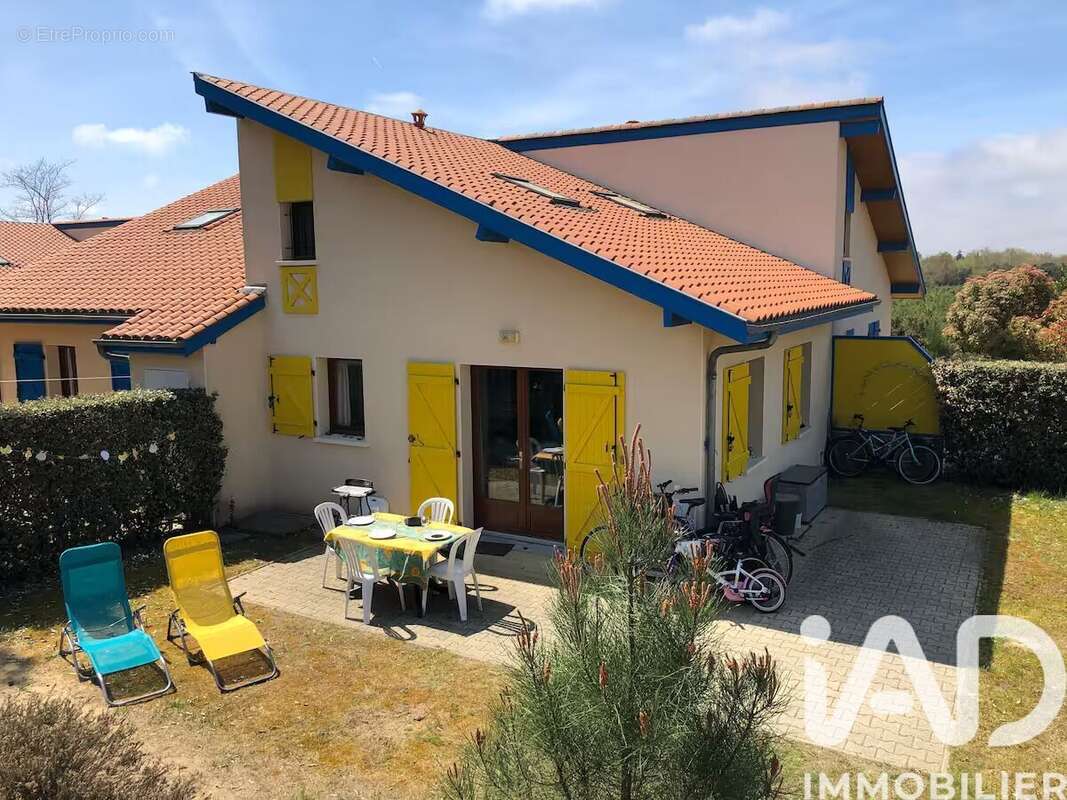 Photo 2 - Maison à SAINT-JULIEN-EN-BORN
