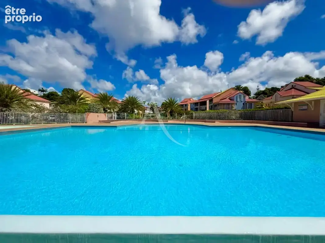 Le Gosier Bas-du-Fort : T3 d'exception avec Jardin, Piscine et Accès Plage Direct - photo 8