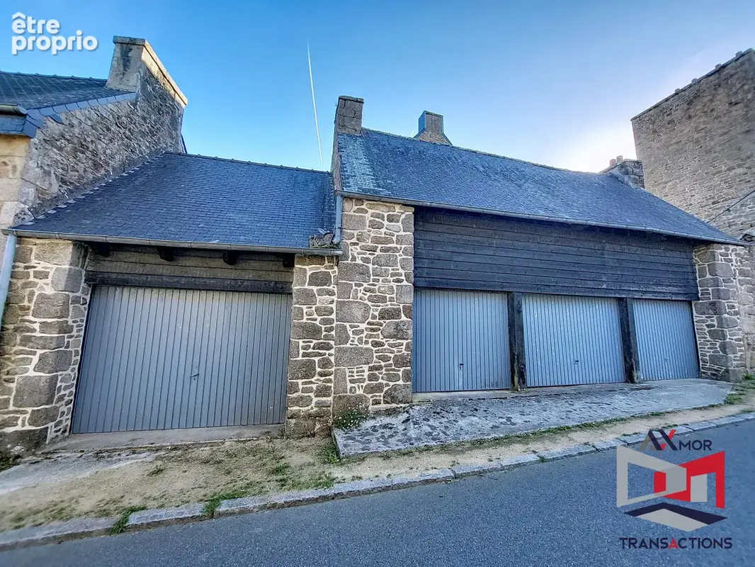 Ensemble de 4 garages à proximité immédiate du bourg - photo 3