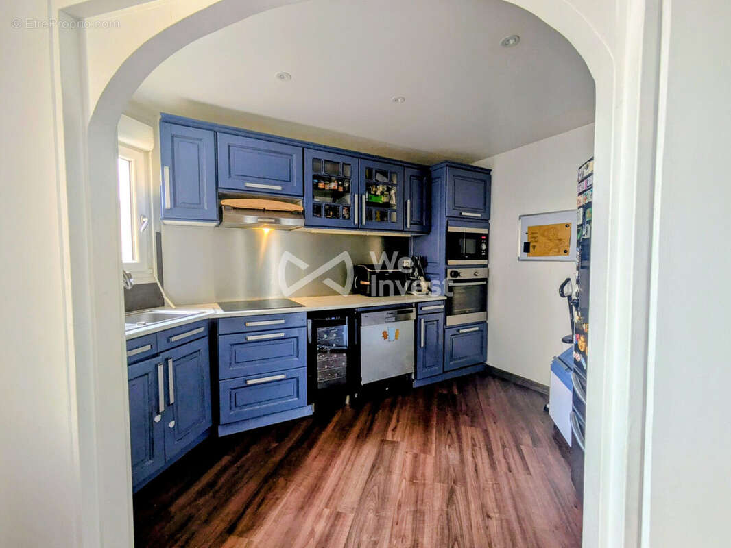 Accès cuisine  - Appartement à ASNIERES-SUR-SEINE