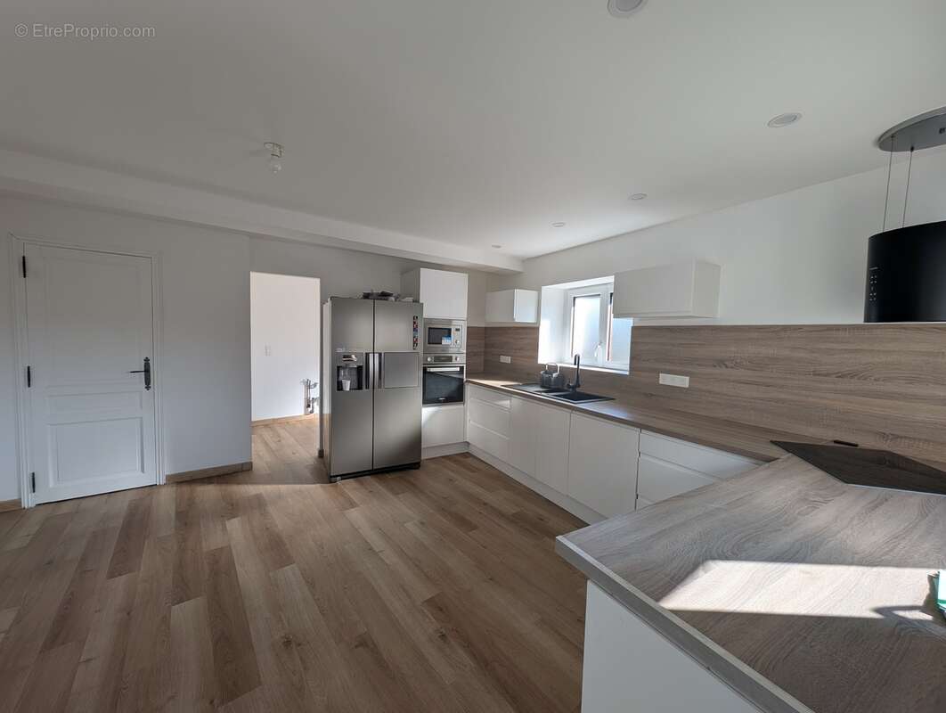 n°12 - Maison à DAGNEUX