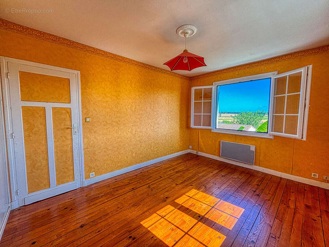 Maison familiale à Breuillet dans un environnement calme - photo 7