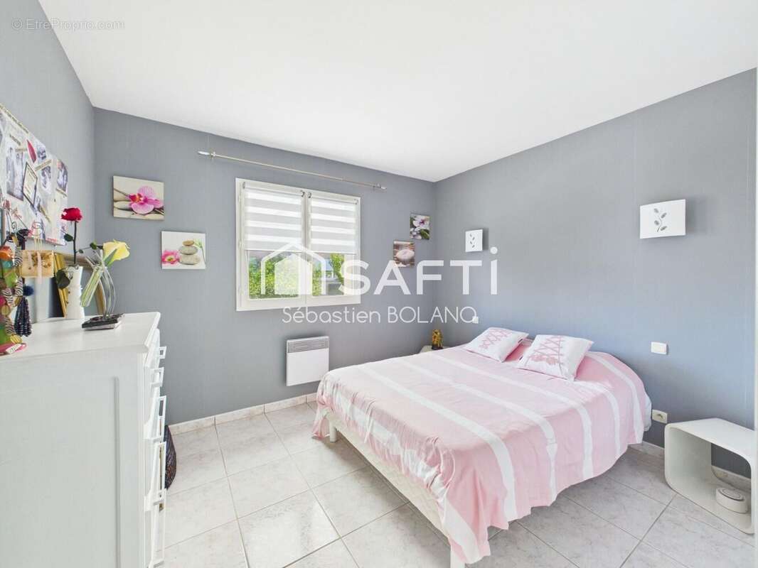 Maison 106 m² à Claira  - photo 8