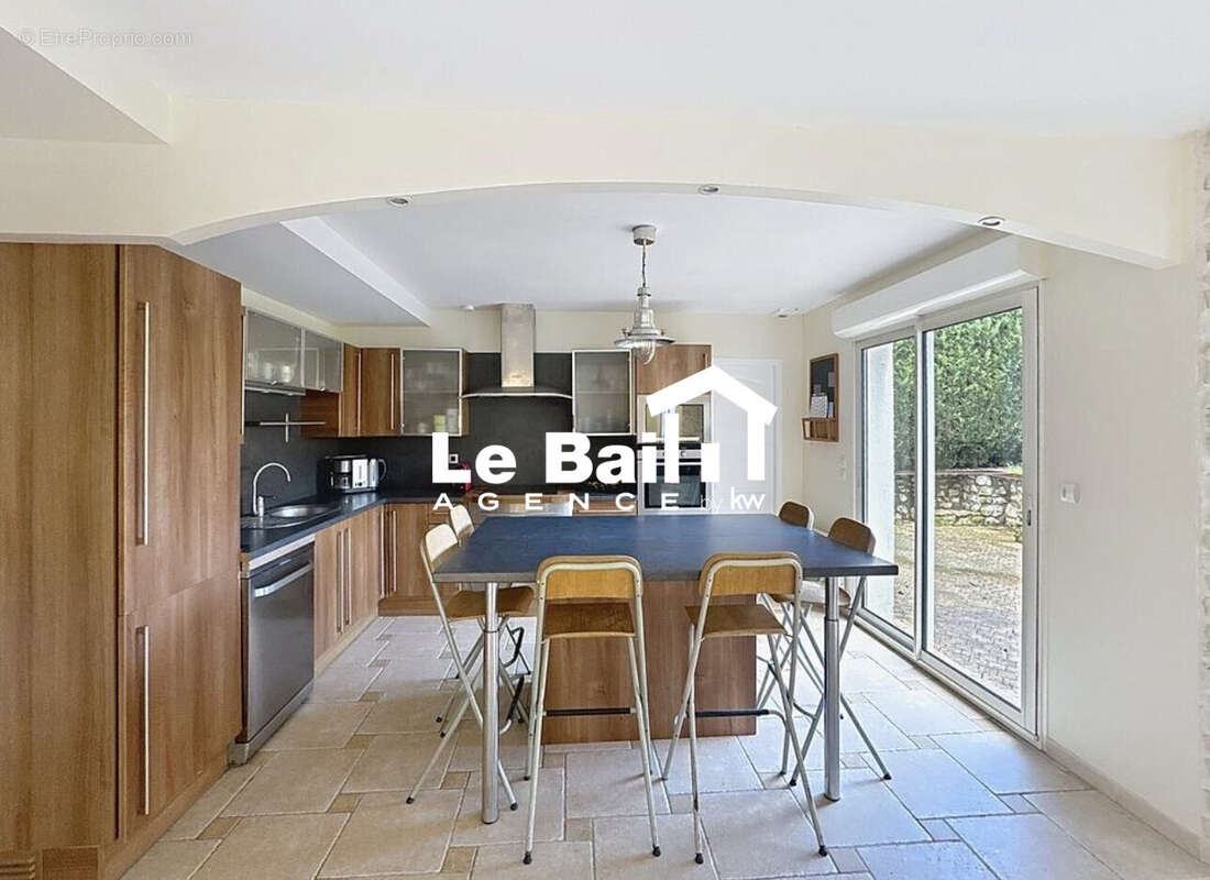 Maison 168 m² à Osny  - photo 4