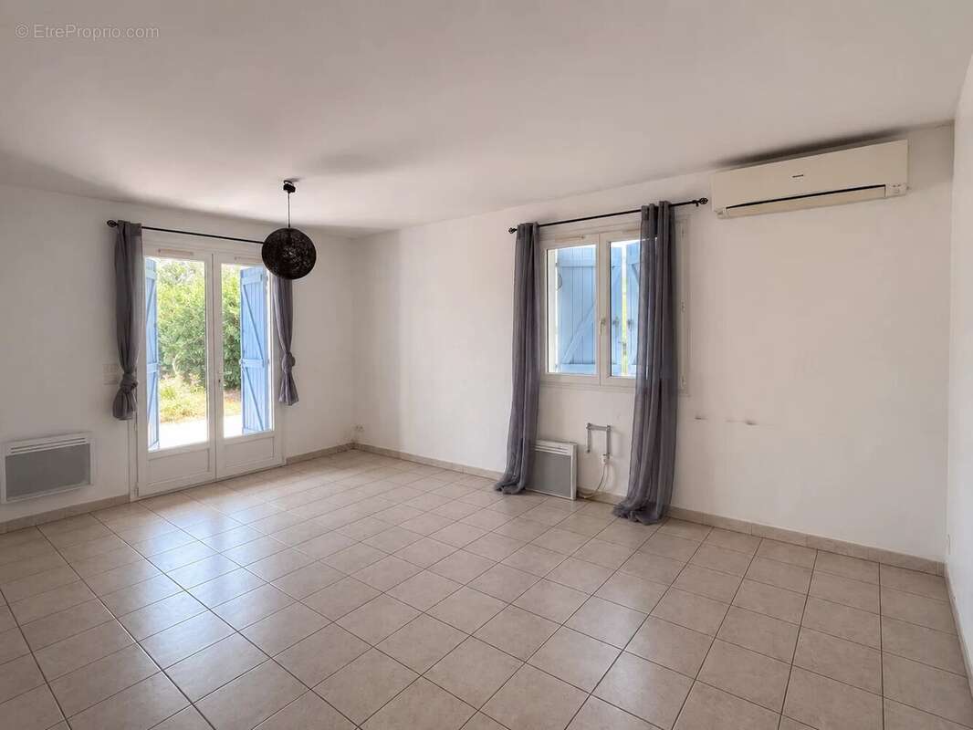 Maison T4 de plain-pied 95 m² - photo 2