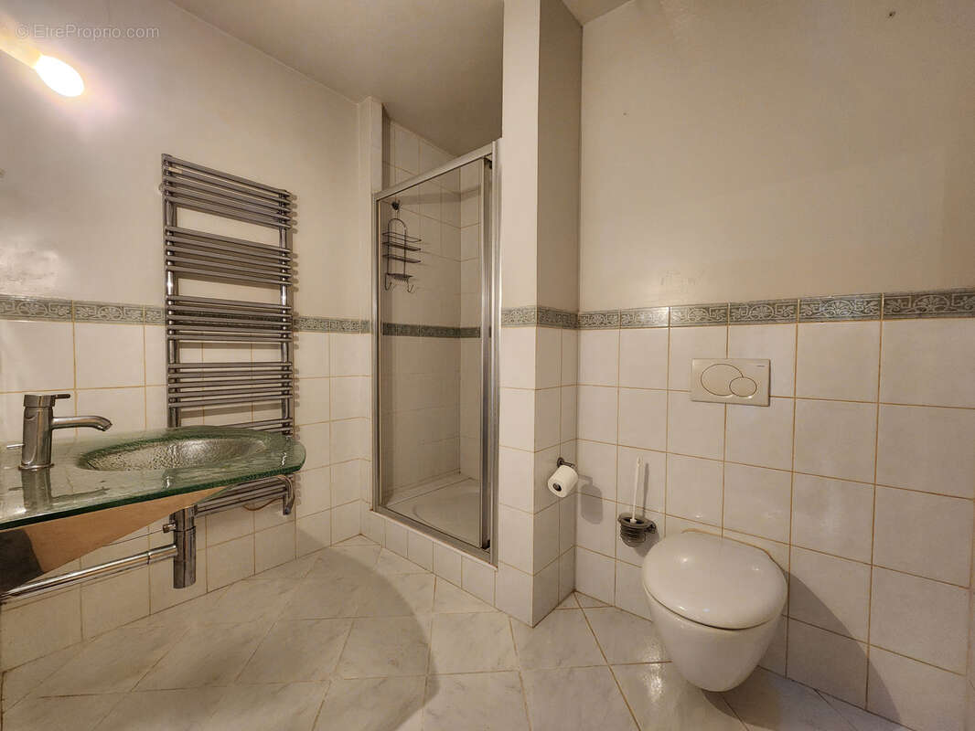 Centre ville appartement t5 de 135.82m2 avec garage - photo 5