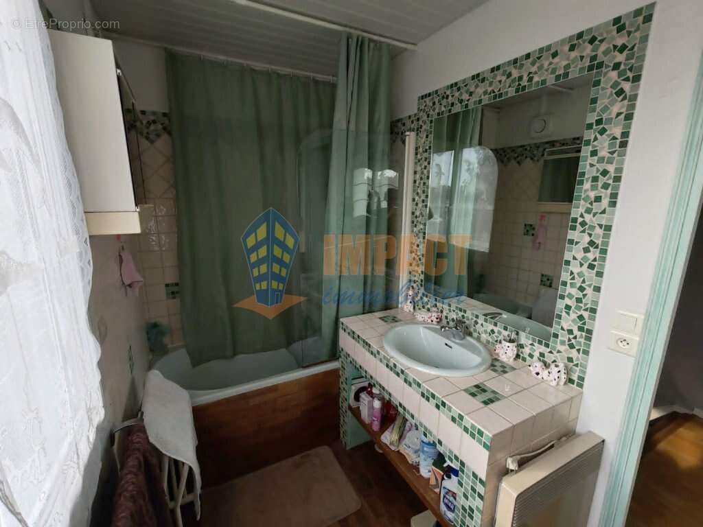 Maison bel étage avec 3 chambres, grand garage, 2 places de parking et beau jardin - photo 10
