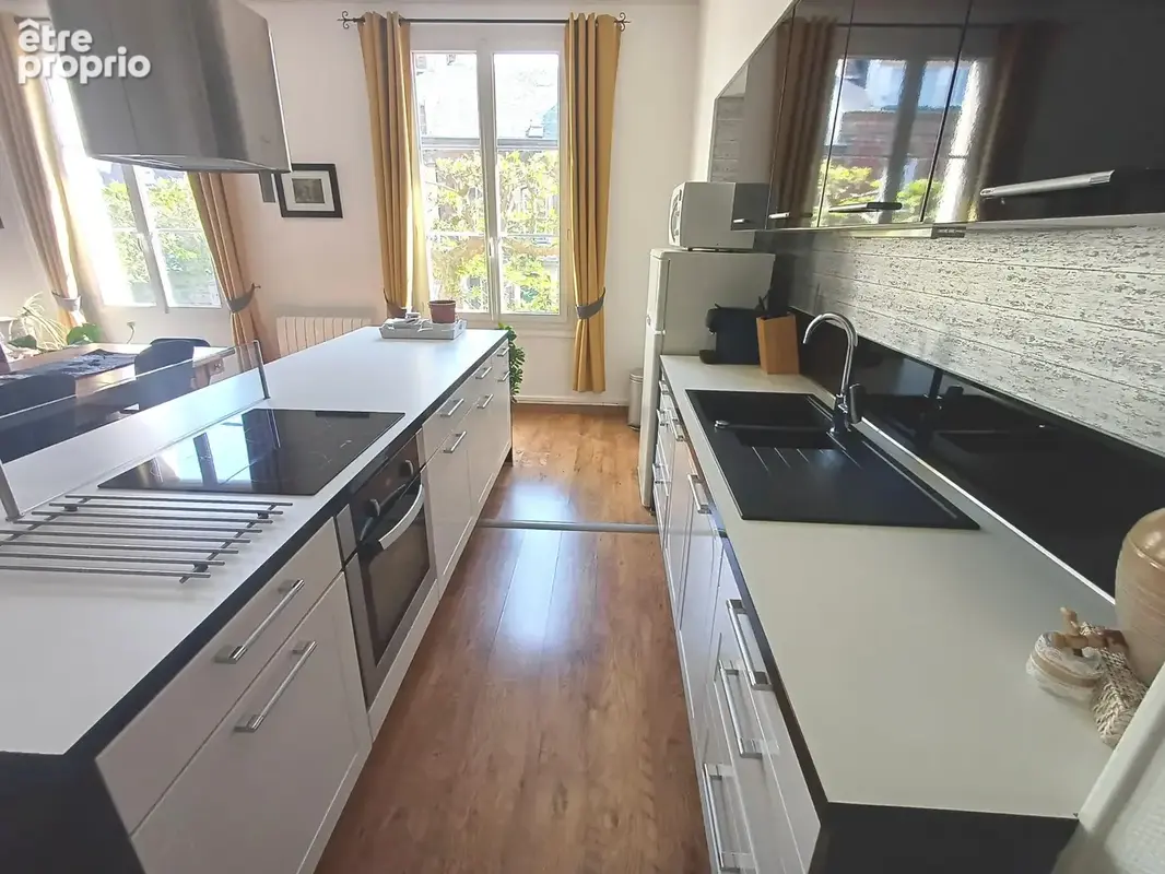Bel Appartement Bourgeois avec Place de Stationnement à proximité du Centre Ville - photo 2