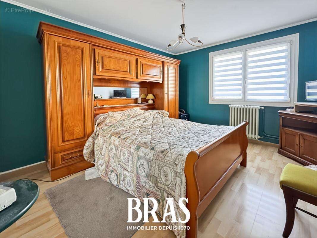 Saint sebastien sur loire - appartement t3 + cave + parking - photo 9