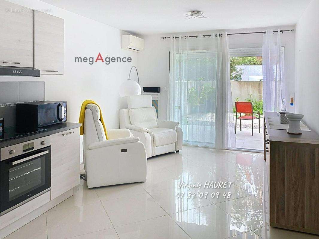 Appartement en rez-de-chaussée - 1 chambre - 1 terrasse de 48m² - photo 2