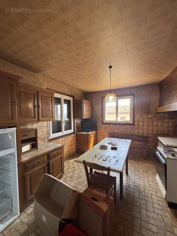 Maison de plain pied avec sous sol semi enterré - photo 5