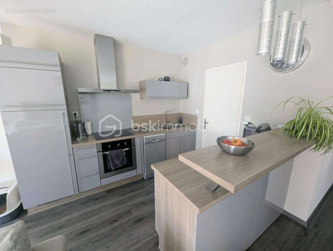 Appartement en RDC avec un grand balcon / extérieur et garage situé à FOUGERES 35300 - photo 3
