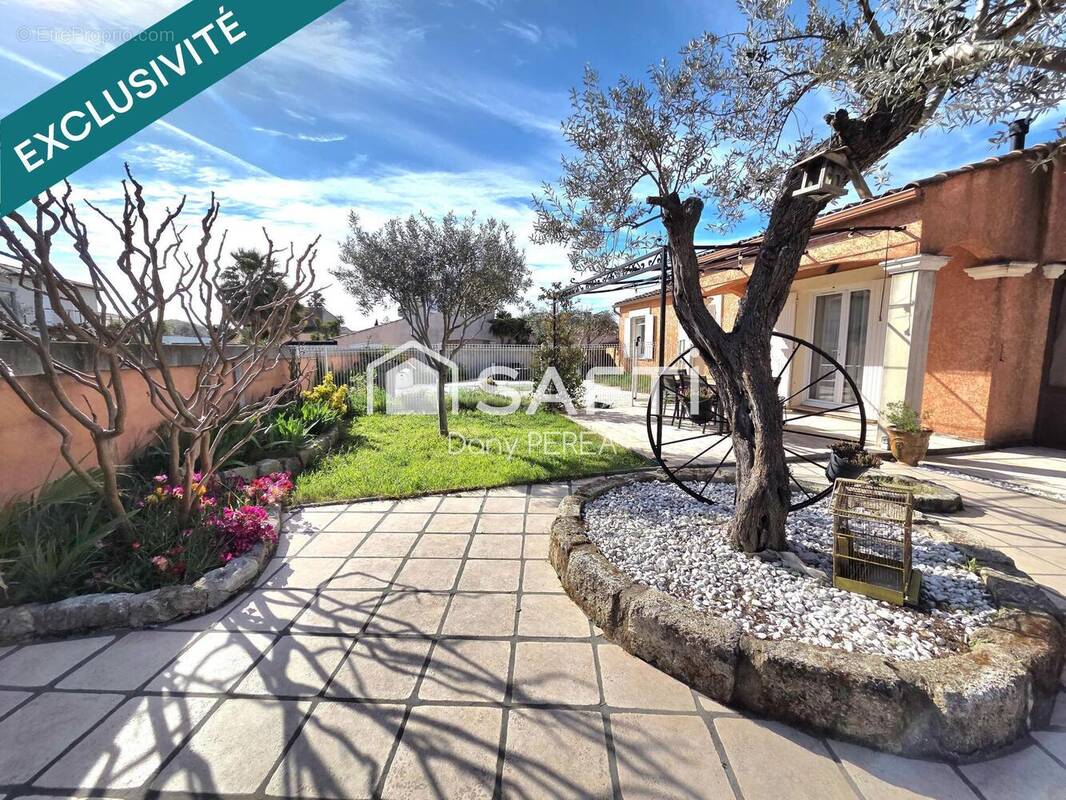 Photo 1 - Maison à SAINT-LAURENT-D'AIGOUZE