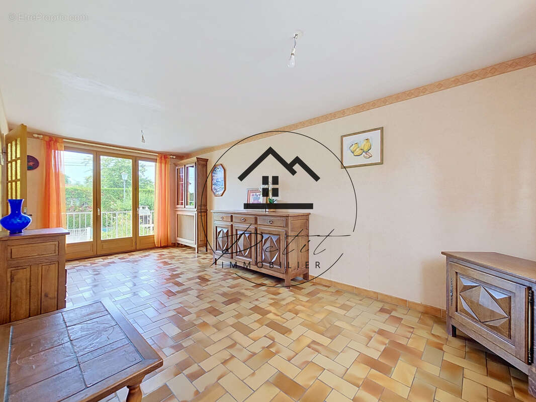 Maison familiale de 107 m2 avec 4 chambres et sous-sol total - photo 2