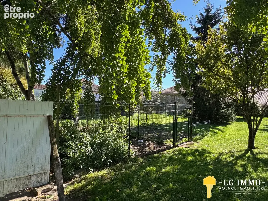Maison de plain-pied avec jardin et garage en centre ville - photo 44