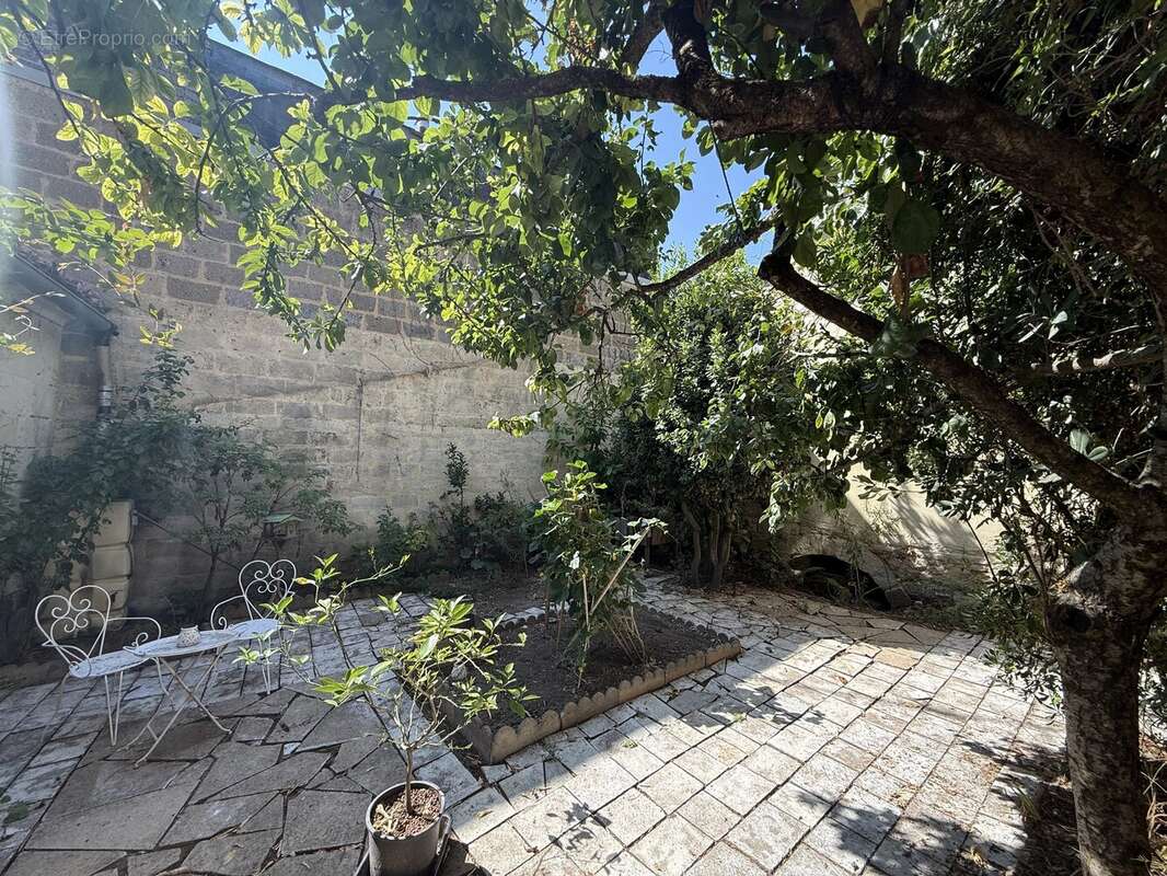 Vie urbaine dans une demeure dotée de jardins clos - photo 20