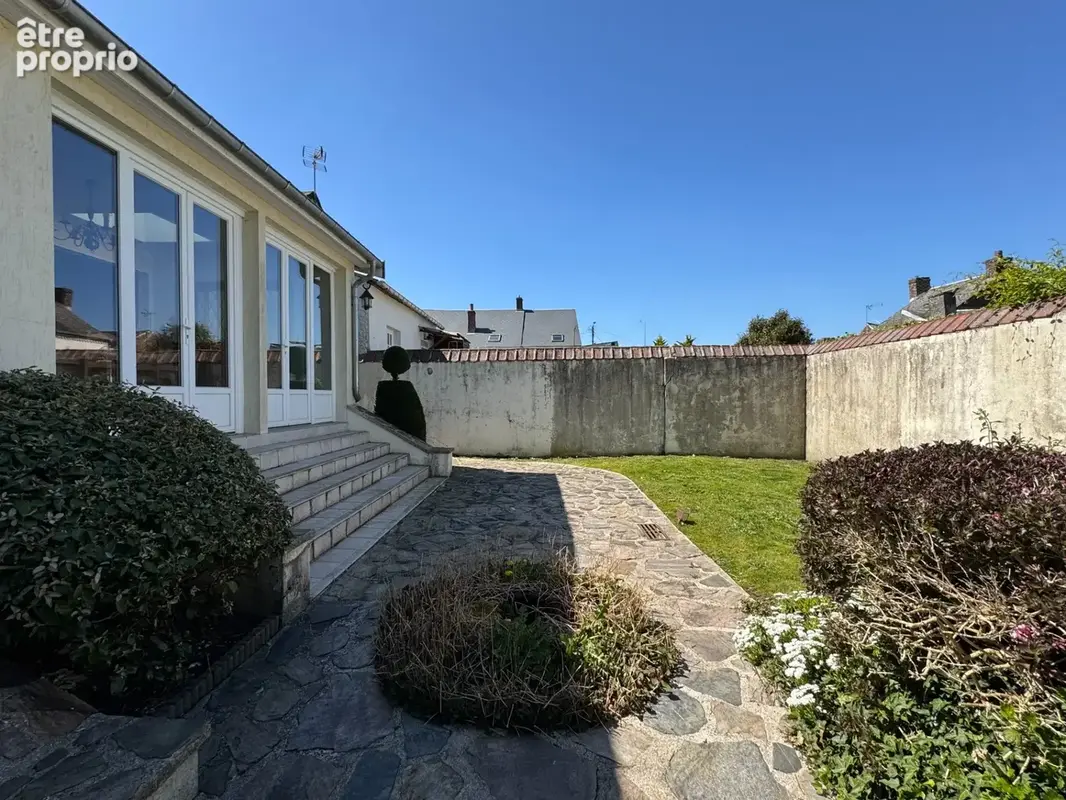  Élégante maison semi-individuelle – Centre-ville de Fourmies – 159 m² – Jardin arboré – Garage 45 m² - photo 6