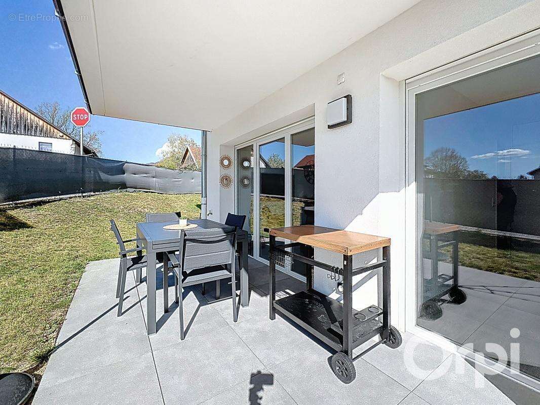 NANGY - Appartement rez-de-jardin - photo 12