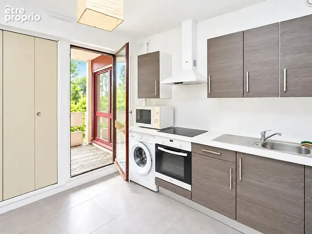 Appartement 2 pieces  59 m² - terrasse 14 m² - au calme - cave et parking - photo 5