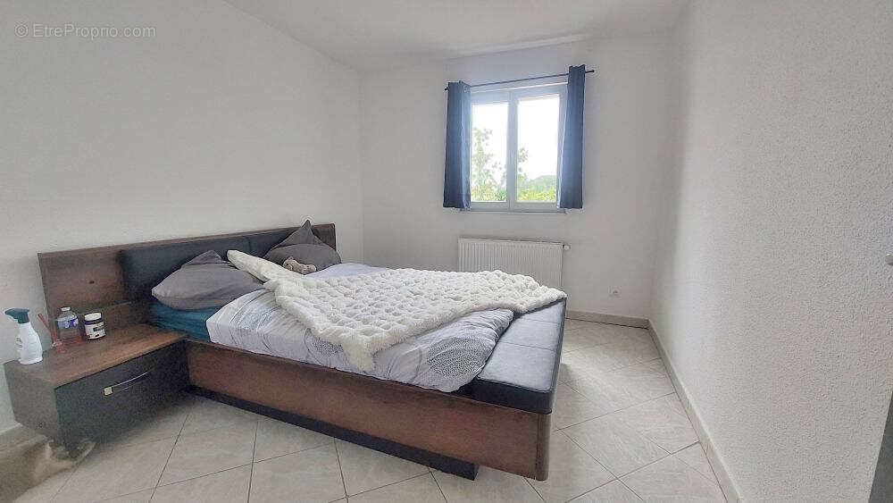 Maison de plain-pied sur Plateau de Blamont 107 m2 - 643m2 de terrain plat et arboré - photo 4