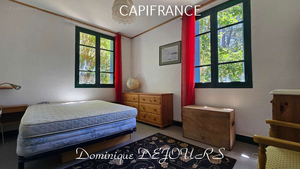 Nichée au cœur de la nature, sans vis-à-vis et avec une vue remarquable, grande maison de 7 (voir 8) chambres et de belles terra - photo 27