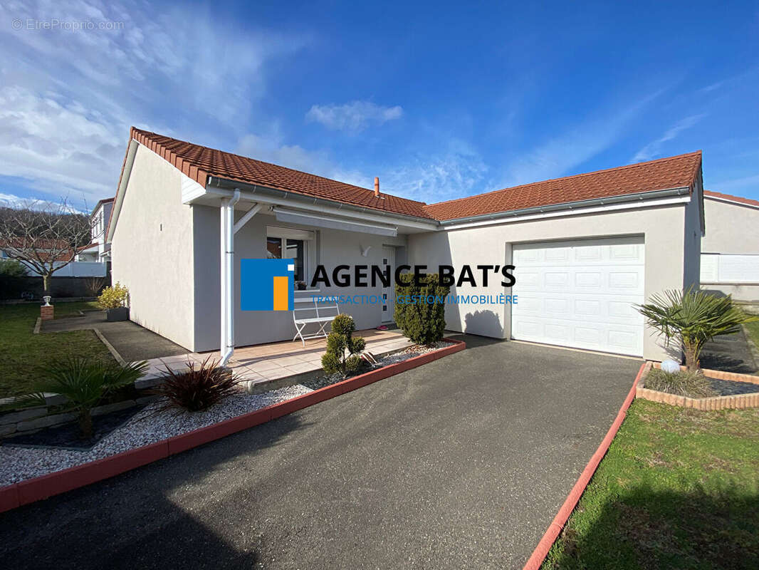 Photo 2 - Maison à ROCHE-LA-MOLIERE