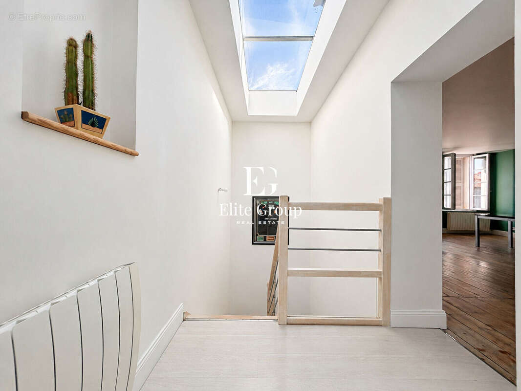 Élégant appartement esprit maison de ville avec terrasse sur les toits - photo 6