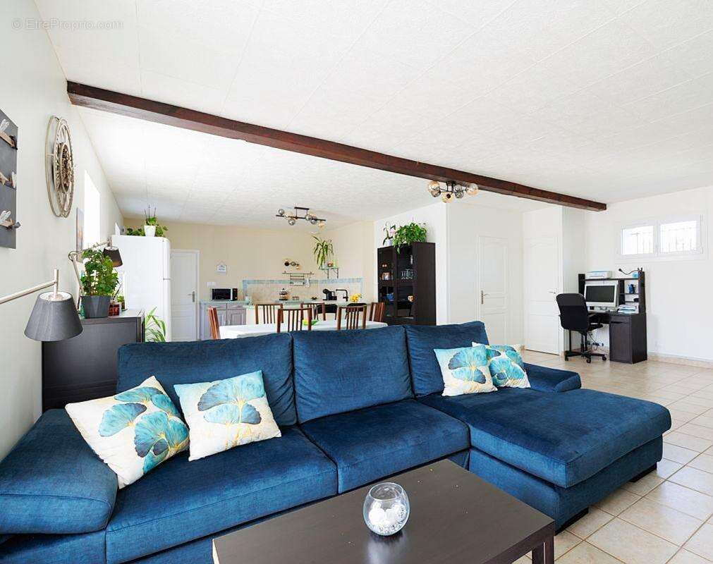 Maison à SAINT-GENIS-LES-OLLIERES