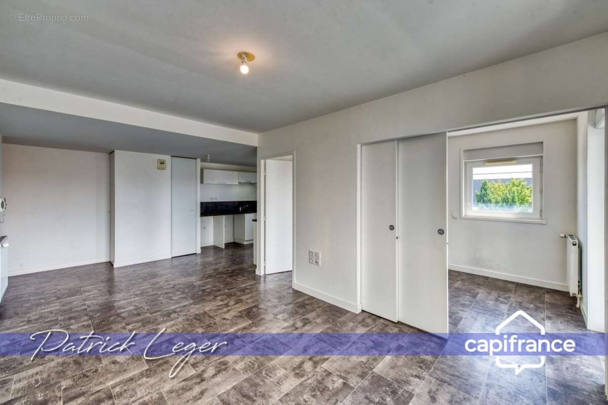 PÉRIGNY (17) – Élégant T3 modulable avec grande terrasse couverte & parking sous-sol - photo 3