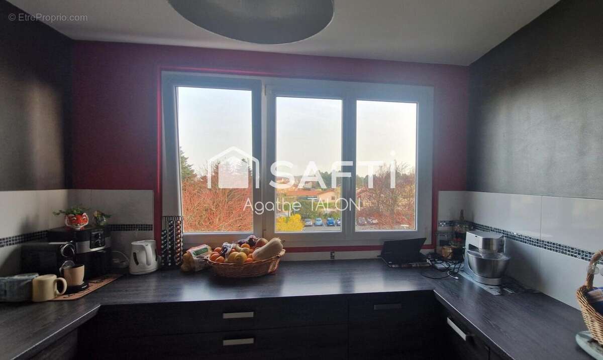 Photo 2 - Appartement à RILLIEUX-LA-PAPE