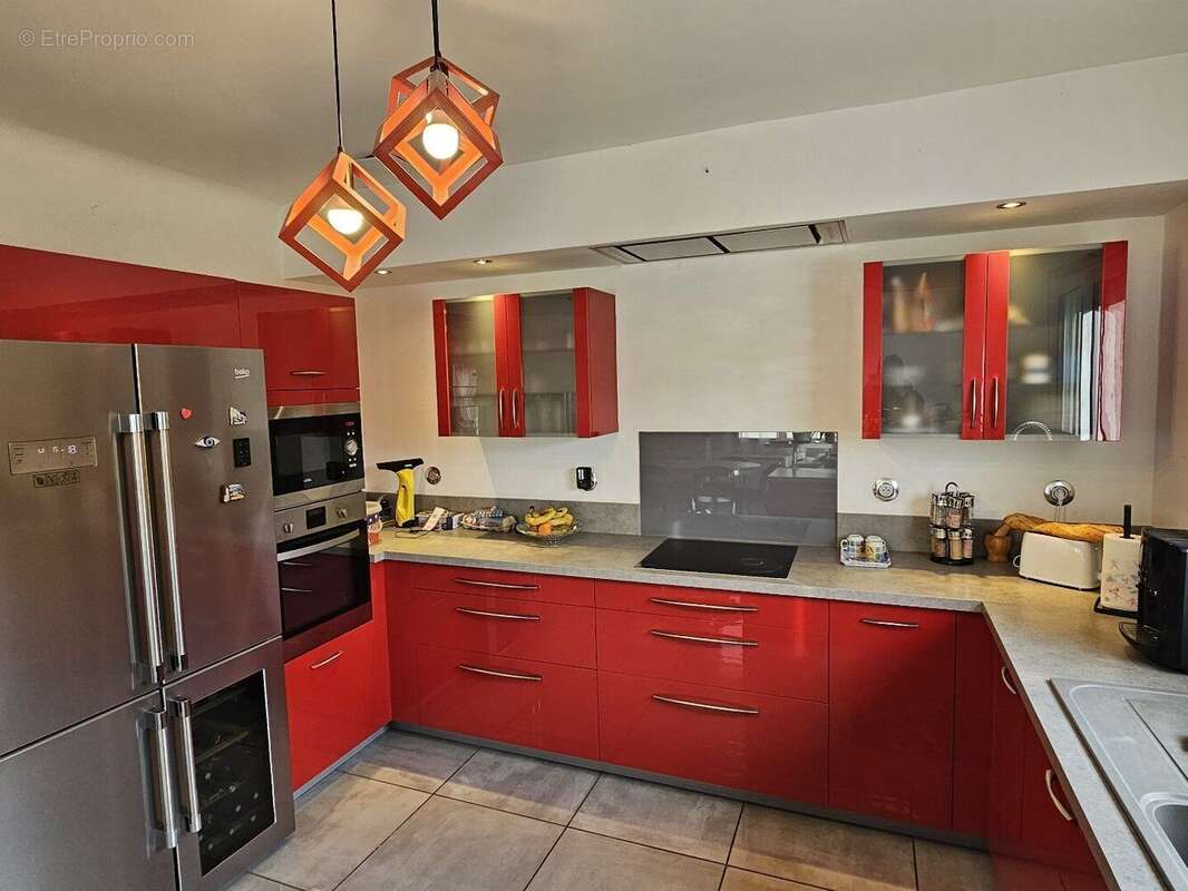 Maison en vie de plain-pied avec jardin et garage - photo 2