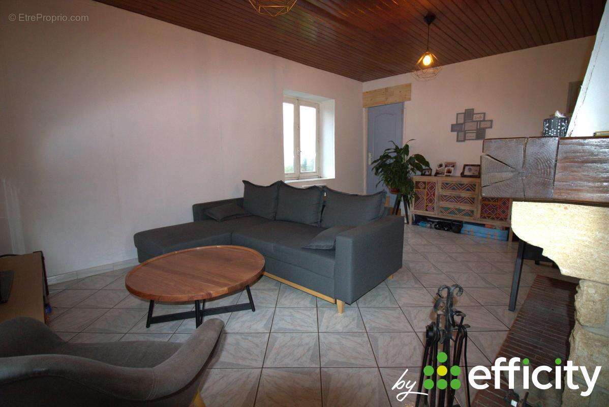 Maison à SOURCIEUX-LES-MINES