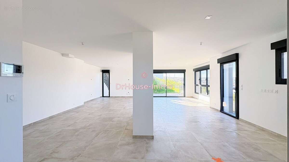 Maison à TOURLAVILLE