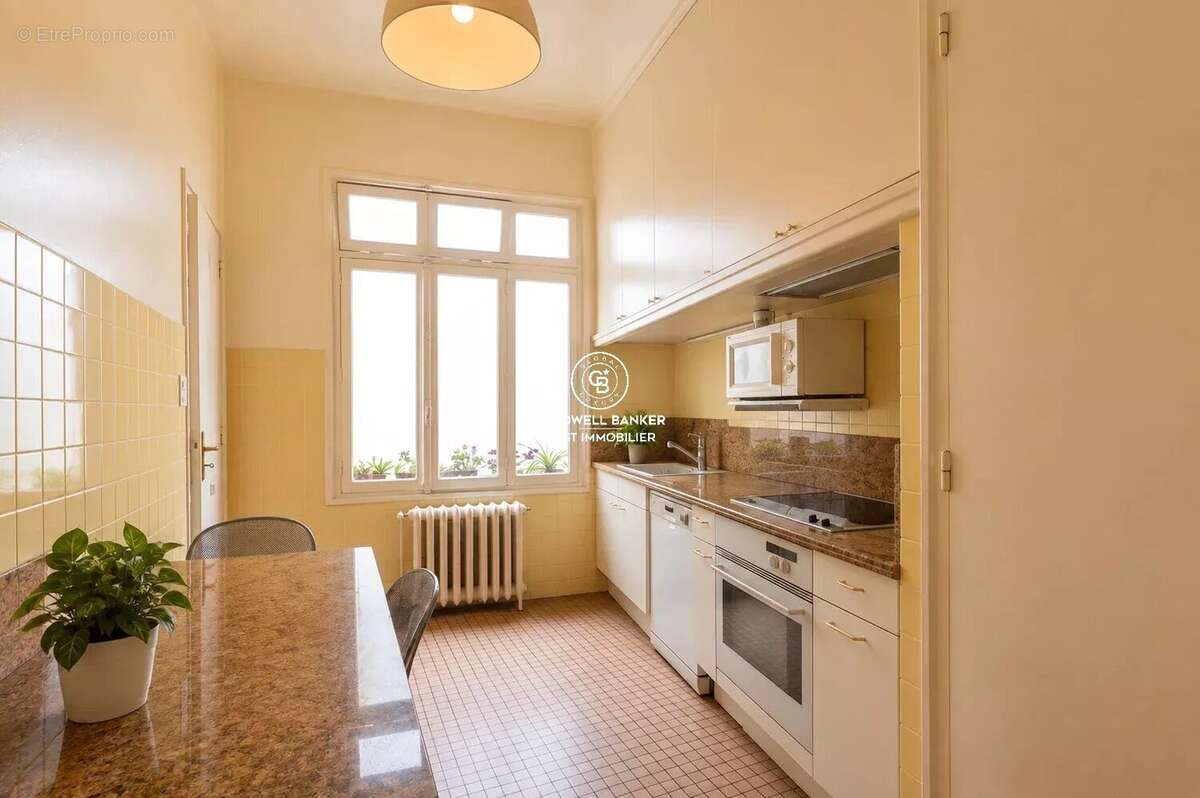 Appartement bourgeois d’exception – Une adresse prestigieuse au cœur de Perpignan - photo 11
