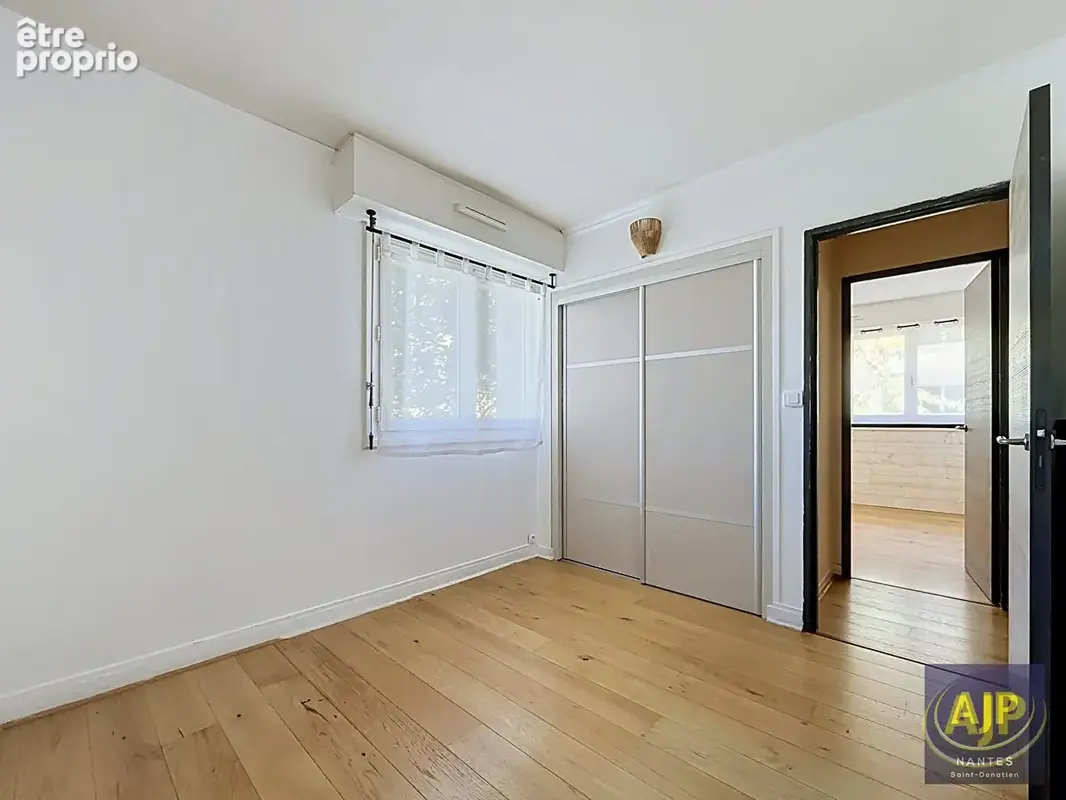 AJP IMMOBILIER NANTES - T3/T4 lumineux de 70 m² - Quartier Cité des Congrès / CHU - photo 11