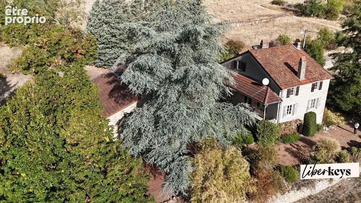 Maison en pierre - rénovée - 1930 m² de terrain - 3 chambres - grange et caves - photo 1