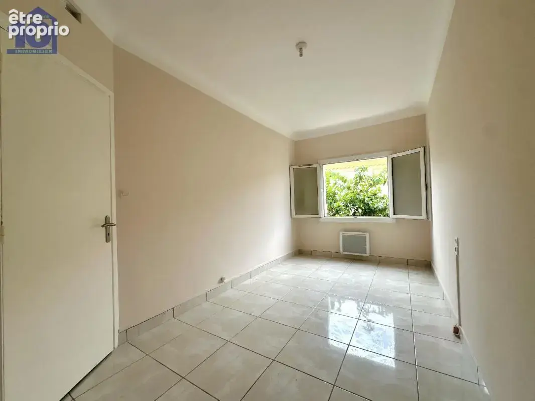 Appartement en rez-de-jardin - photo 4