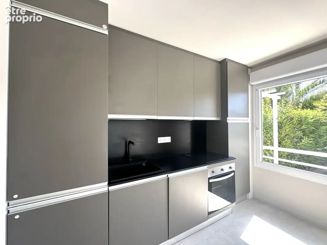 Appartement 3 pièces rez de jardin - photo 5