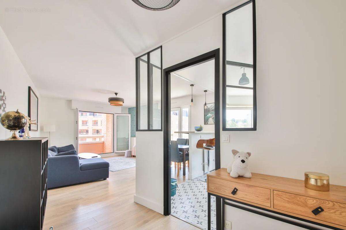 Appartement de 3 pièces de 70,5 m² à Cachan vendu loué meublé - photo 3