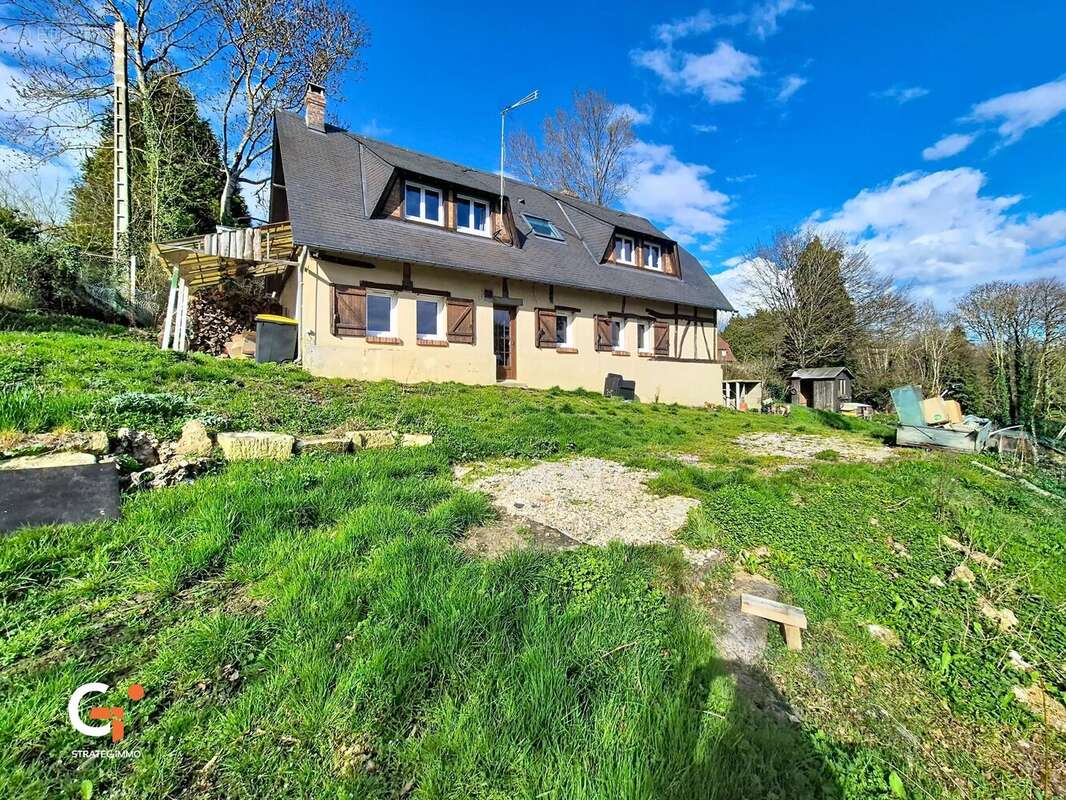 Maison à SAINT-OUEN-DE-THOUBERVILLE