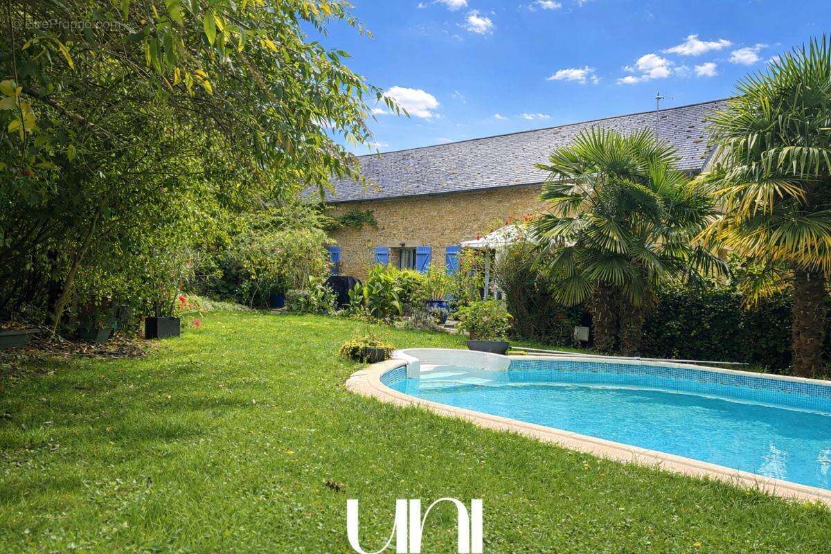 Maison à MEZIDON-CANON