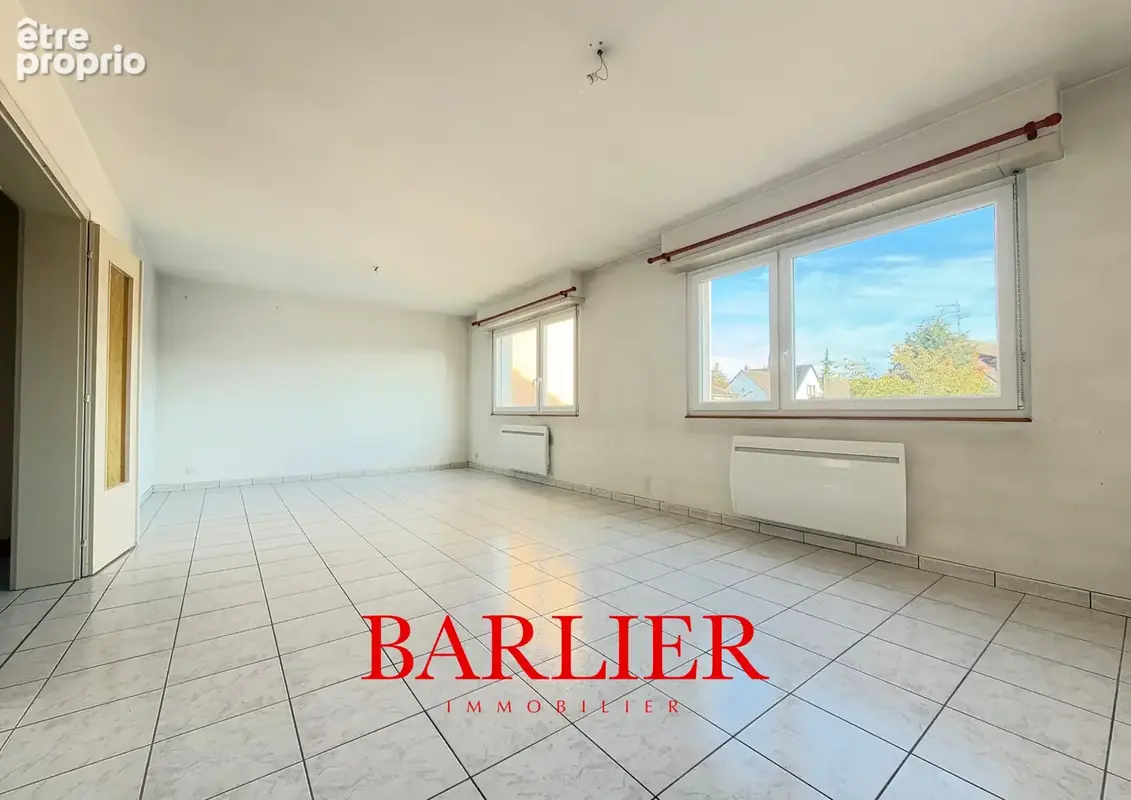 Appartement 4 pièces de 92 m2 avec garage, caves et jardin. - photo 4