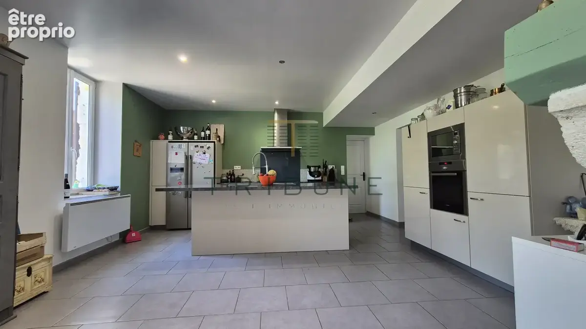 Maison en pierre 230m2 avec jardin, piscine, garage + un terrain constructible de 2000m2 - photo 7