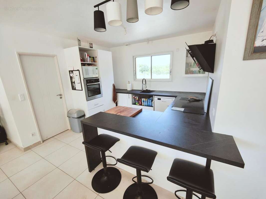 Maison 103 m² à Leogeats  - photo 4