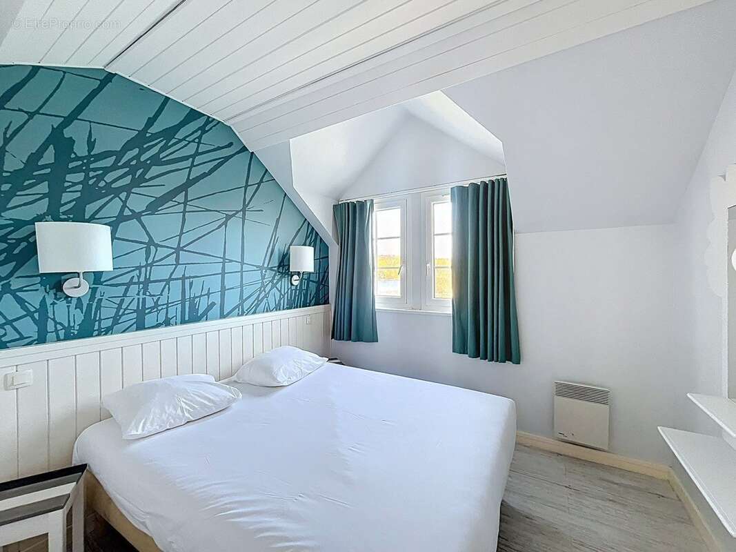 INVESTISSEMENT LOCATIF  CHAMOUILLE  Résidence de tourisme Center Parcs Le Lac d'Ailette - 7 % de rentabilité - photo 6