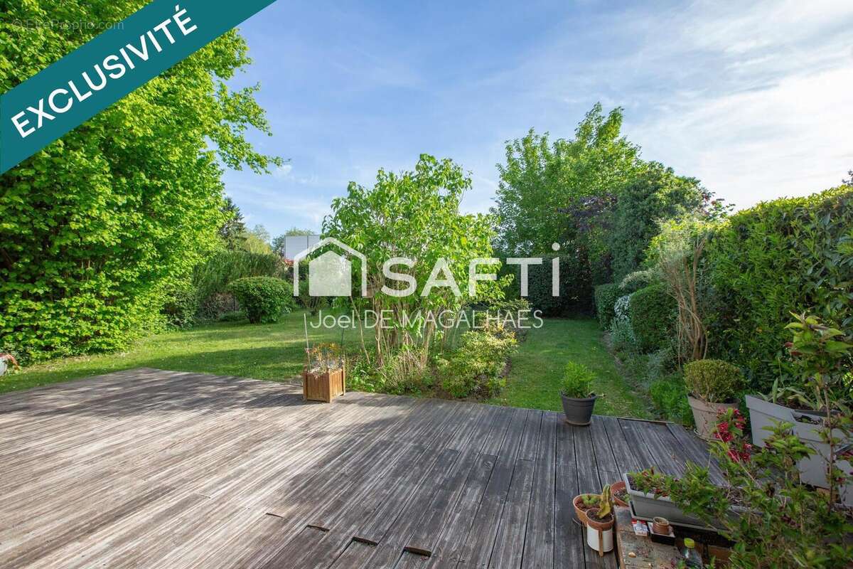 Photo 2 - Maison à LE MESNIL-SAINT-DENIS
