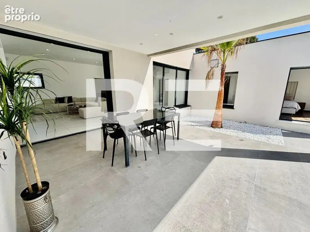 Maison architecte 230m2 sur nimes aec terrain de 2118m2 - photo 6