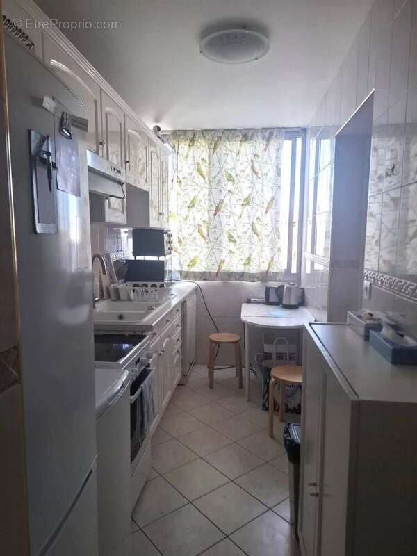 75013 paris appartement 3/4 pieces de 65 m² avec un parking et une cave - photo 3